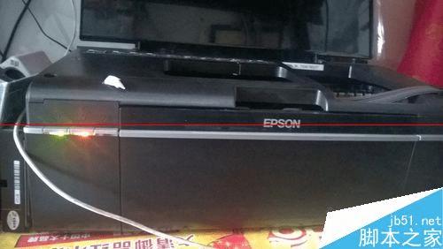 爱普生R330打印机墨水键长亮黄灯是怎么回事?