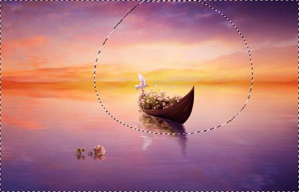 如何在PS中合成霞光中的小艇场景?