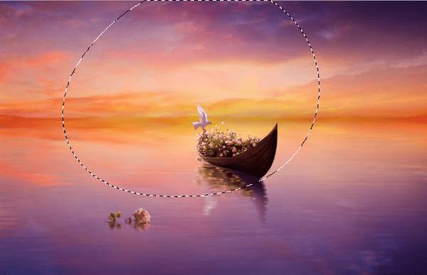 如何在PS中合成霞光中的小艇场景?