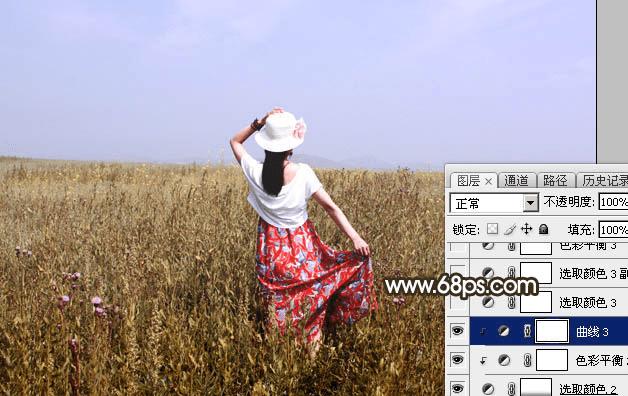 怎么样在ps中调制出秋季冷褐色草原人物图片?