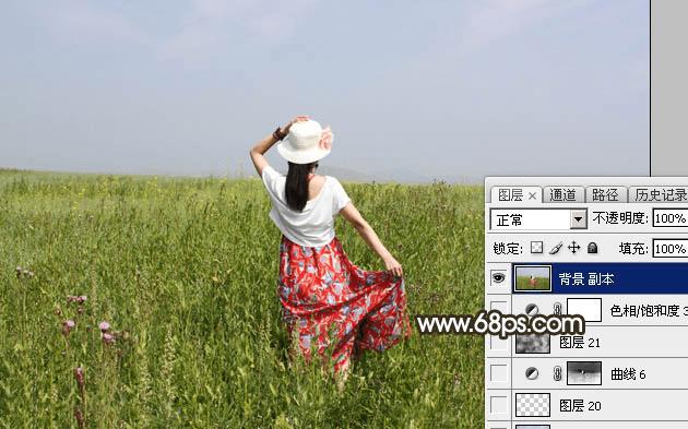 怎么样在ps中调制出秋季冷褐色草原人物图片?