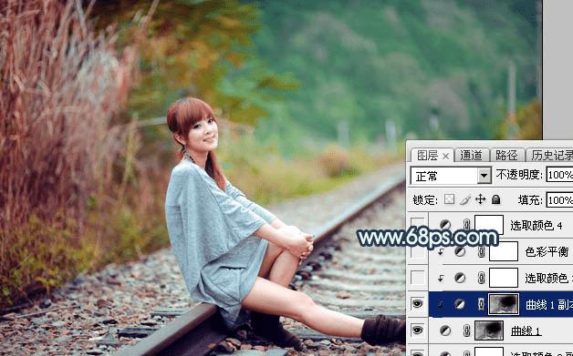 在ps中调制出甜美的暗调青红色铁轨人物图片的技巧
