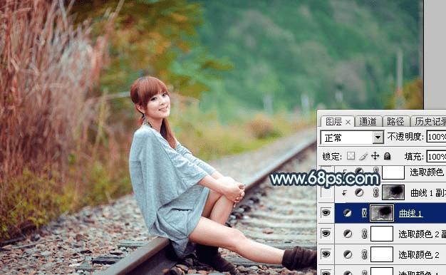 在ps中调制出甜美的暗调青红色铁轨人物图片的技巧