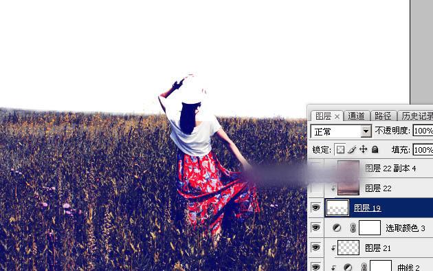 如何在ps中调出偏暖的蓝褐色草原人物图片?