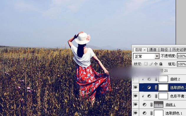 如何在ps中调出偏暖的蓝褐色草原人物图片?