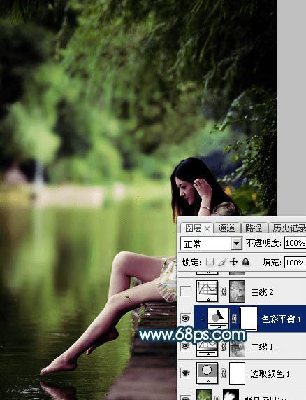 如何在ps中为水景人物图片打造梦幻的暗青色效果?