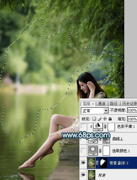 如何在ps中为水景人物图片打造梦幻的暗青色效果?