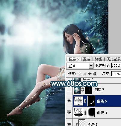 如何在ps中为水景人物图片打造梦幻的暗青色效果?