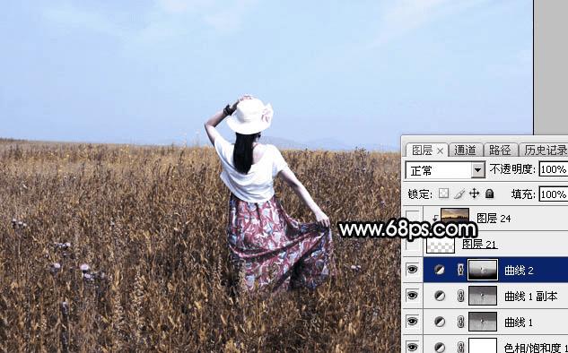 如何在ps中为草原人物图片打造出柔美的黄色?