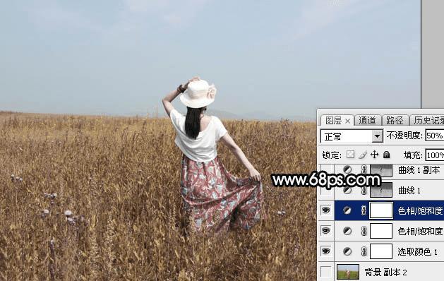 如何在ps中为草原人物图片打造出柔美的黄色?