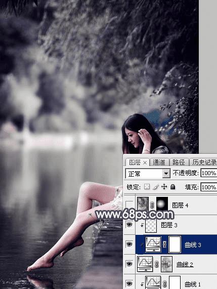 如何在ps中为湖边人物图片加上唯美的中性蓝色效果?