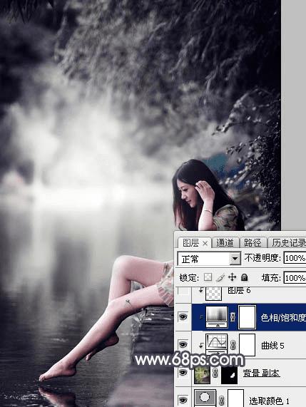 如何在ps中为湖边人物图片加上唯美的中性蓝色效果?